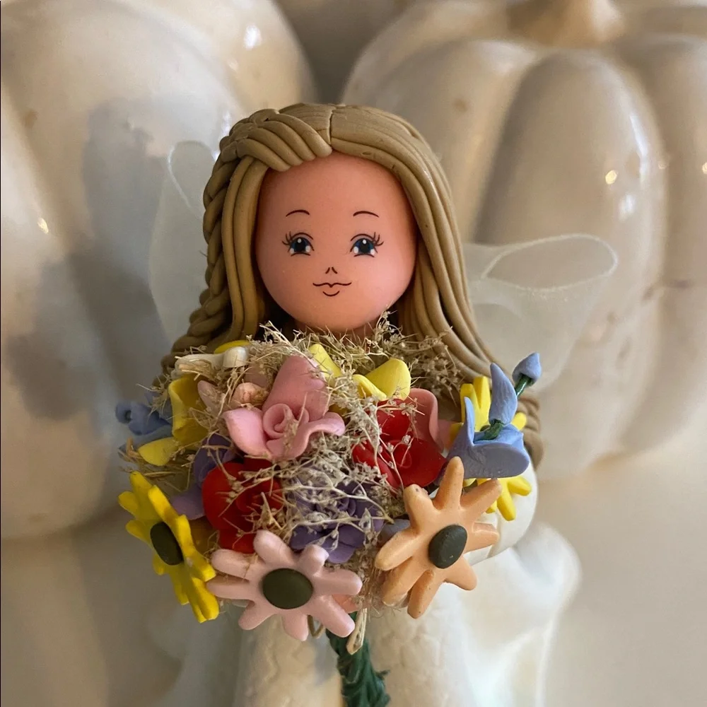 Kneeded Angel Figurine with Pastel Floral Bouquet